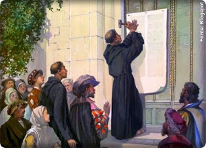 Martinho Lutero pregando suas teses na porta da igreja